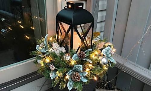 7. Natale una luce con candele floreali