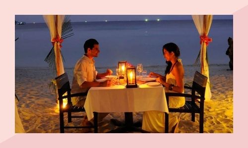 b) Organizza una cena a lume di candela con sentimenti