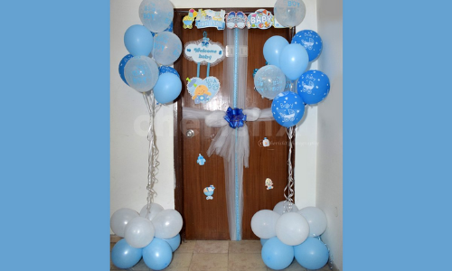 Dai il benvenuto a un nuovo bambino con palloncini fantasia